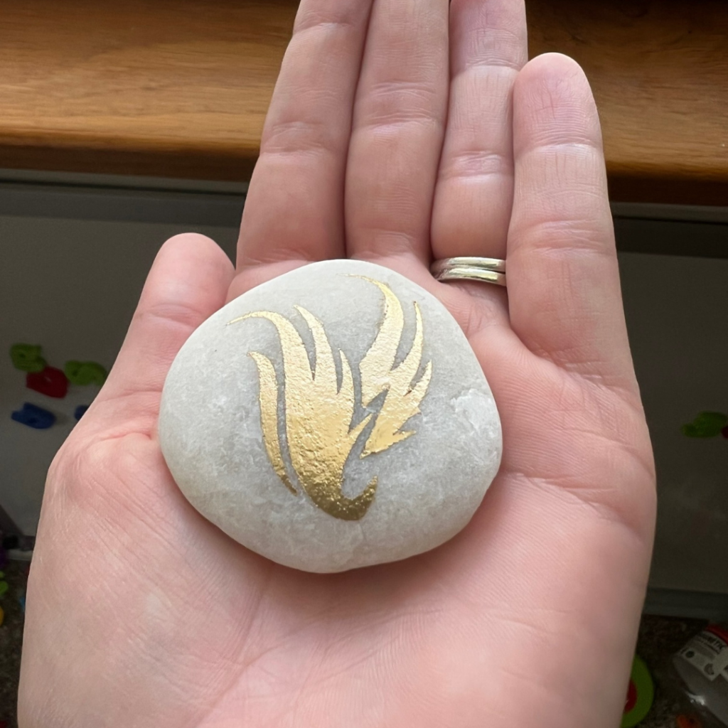 A collection of hand-etched rocks with words of gratitude, by Creative Adventure Co.