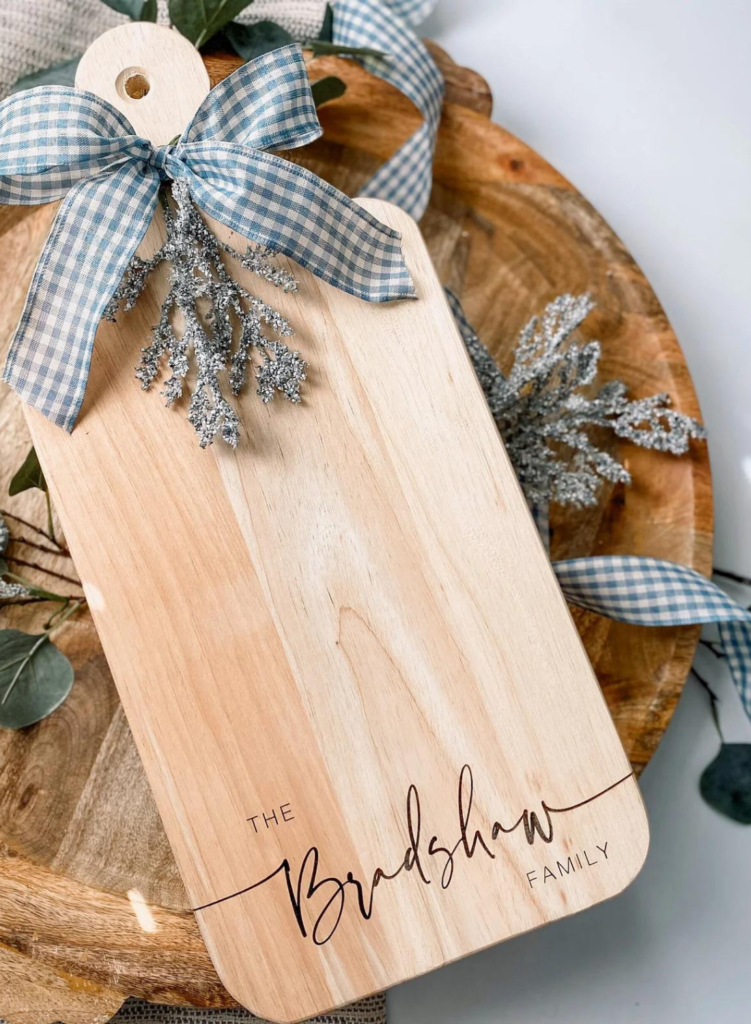 Beautiful custom wood-engraved charcuterie board by Creative Adventure Co.